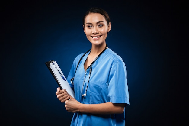 Happy lady with clipboard looking happy