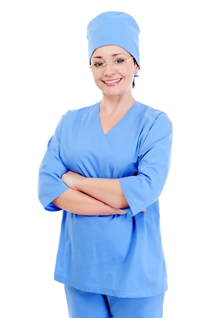 Happy laughing female surgeon in blue uniform