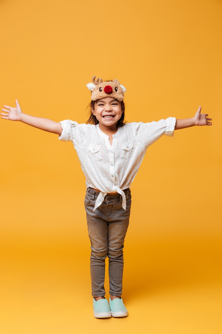 Free Photo happy little girl child wearing christmas cute mask.