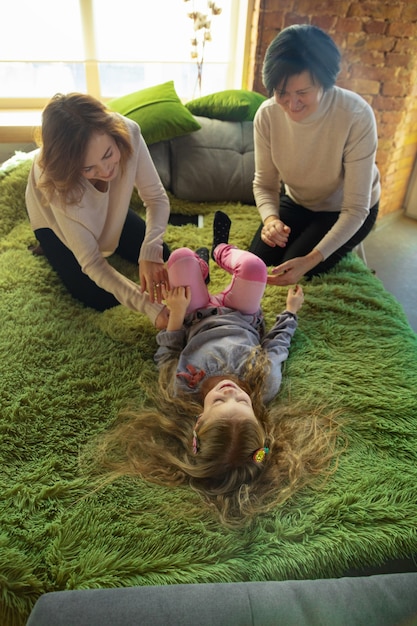 Happy loving family. Grandmother, mother and daughter spending time together