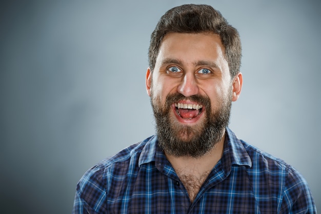 Free photo happy man in blue shirt