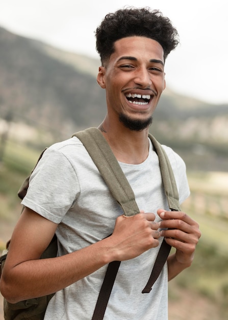 Happy man posing outdoors