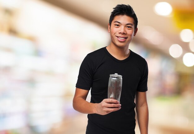 Happy man with an energy drink