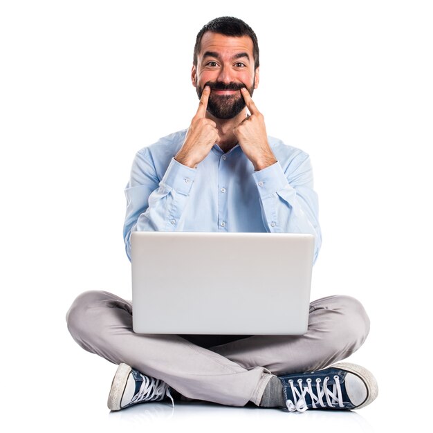 Happy man with laptop