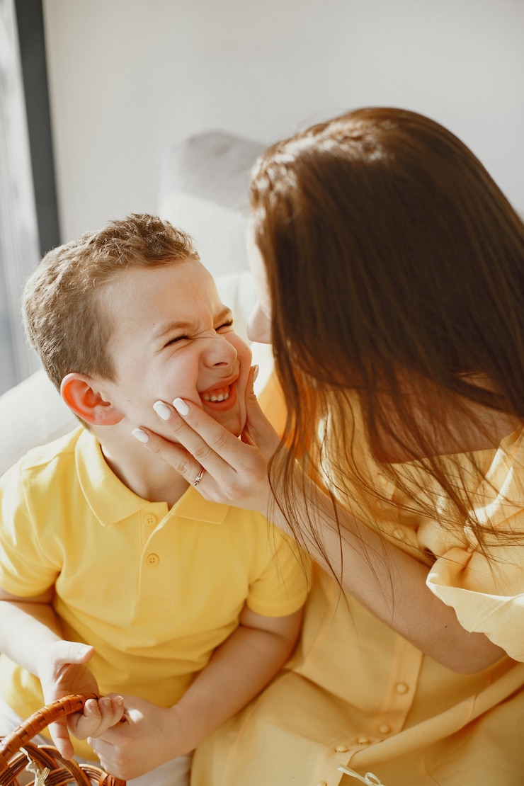 Free Photo happy mom and son. preparing for easter. holiday with family