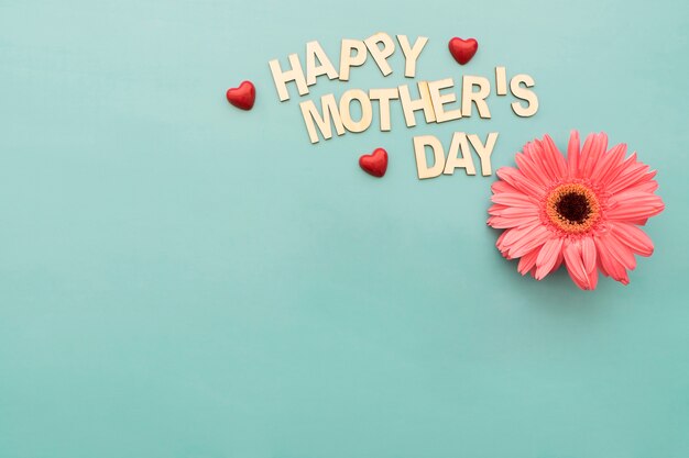 "happy mother's day" lettering with flower