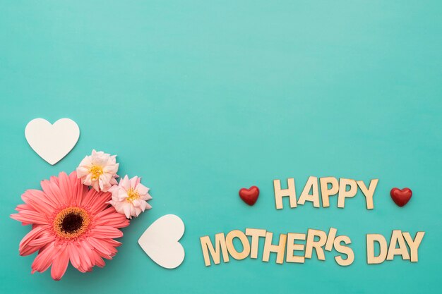 "happy mother's day" lettering with flowers and hearts