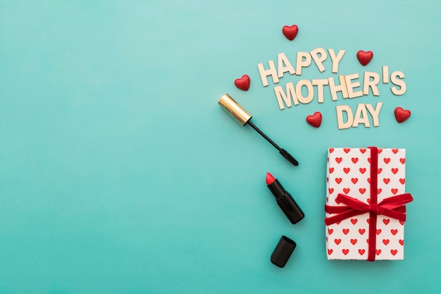 "happy mother's day" lettering with lipstick and mascara
