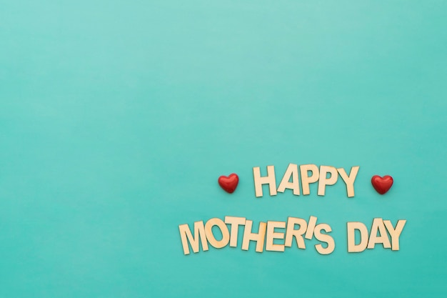 "happy mother's day" lettering with small red hearts