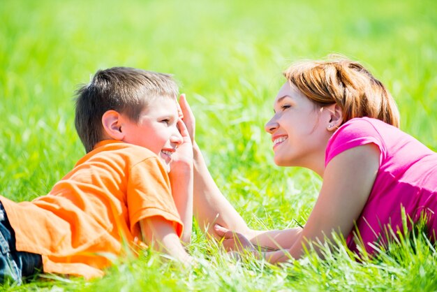 Happy mother and son in the park