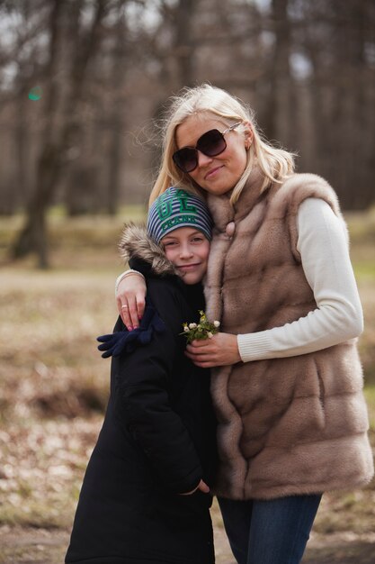 Happy mother and son in the park