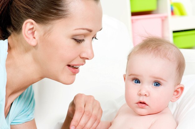 happy mother with cute newborn baby