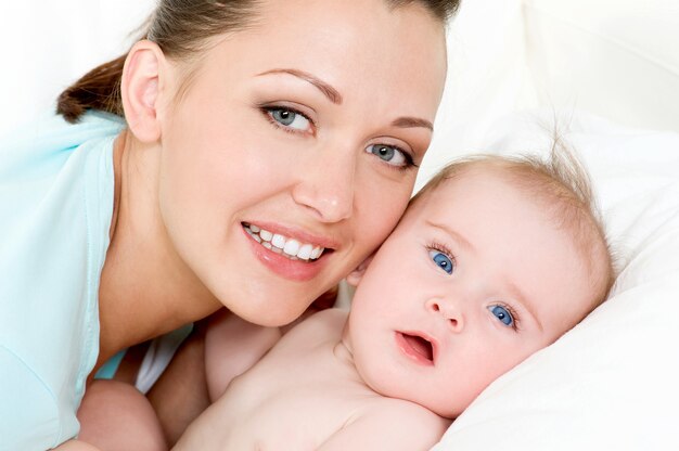 happy mother with cute newborn baby