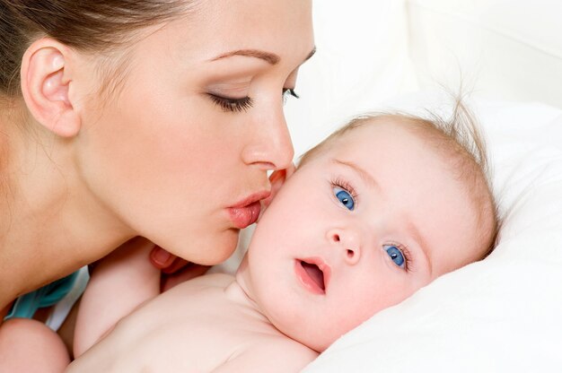 happy mother with cute newborn baby