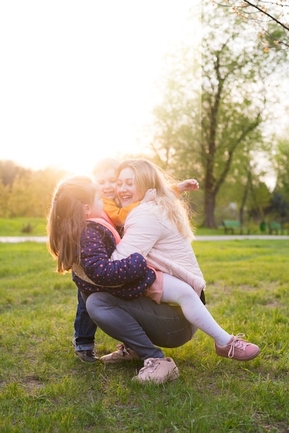 Happy mother with kid in nature