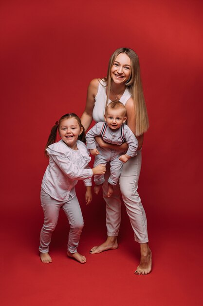 Happy mother with son and daughter.