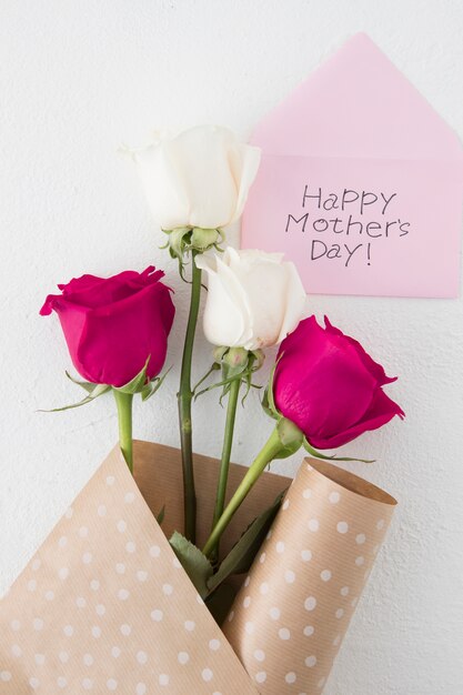 happy mothers day inscription with bright roses 