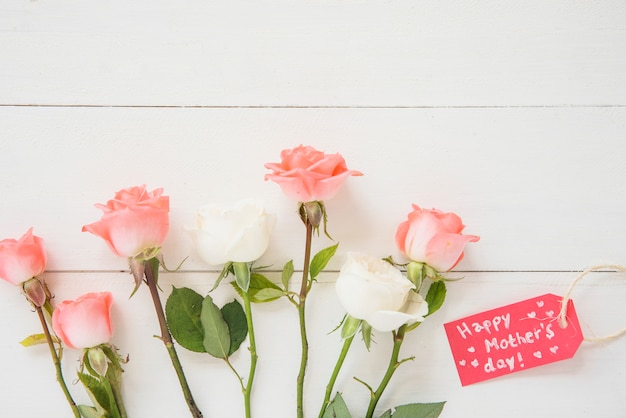 Happy Mothers Day inscription with roses 