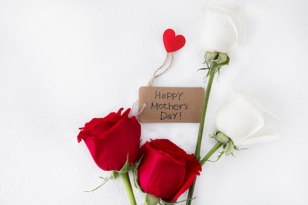 Free photo happy mothers day inscription with roses