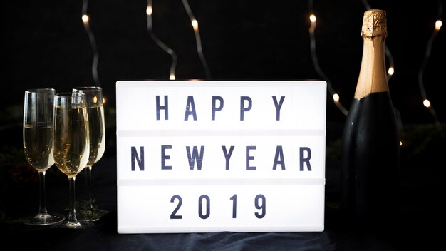 Happy New Year 2019 inscription on white board