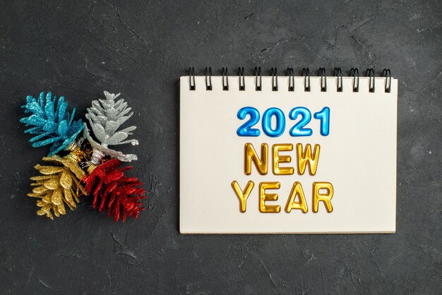 Happy new year 2021 message over notebook