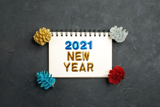 Happy new year 2021 message over notebook