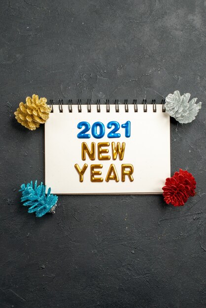 Happy new year 2021 message over notebook