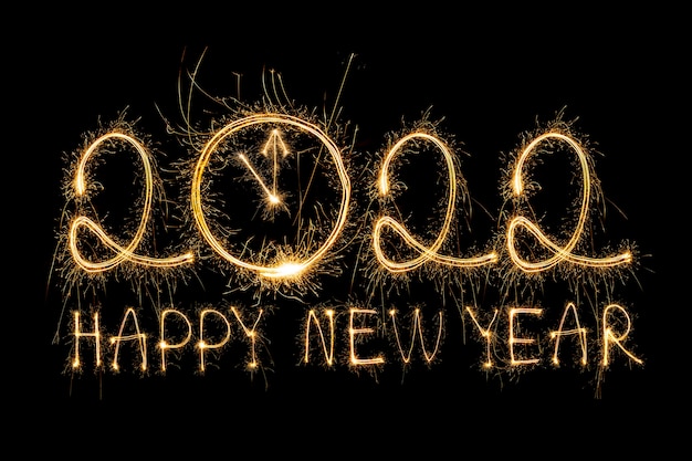 Happy new year 2022 sparkling burning text happy new year 2022 isolated on black background beauti