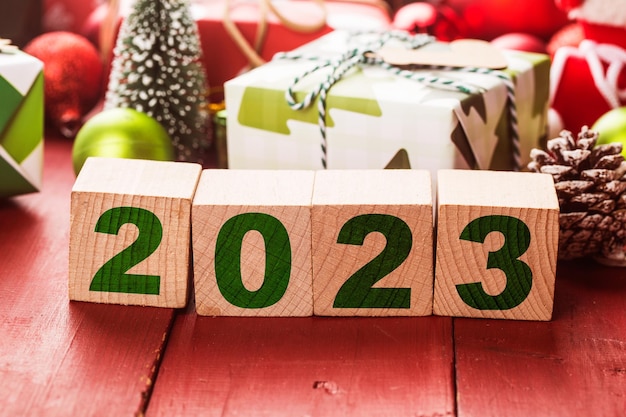 Happy new year 2023, christmas 2023, christmas gifts placed in a festive atmosphere