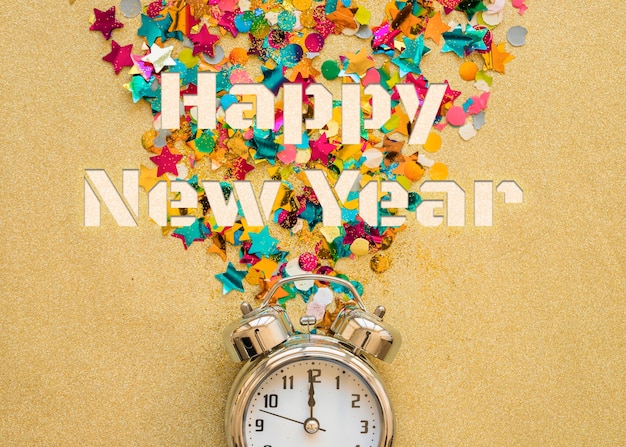 Foto gratuita banner di felice anno nuovo con orologio