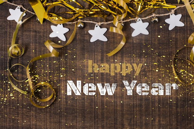 Happy new year banner with ribbons