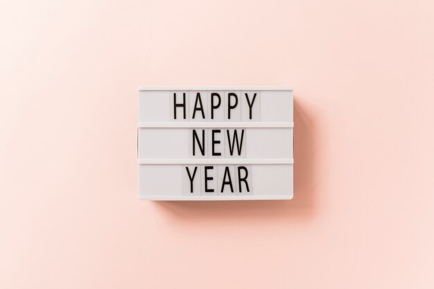 Happy New Year inscription on white board