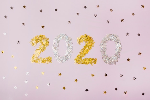 Happy new year with numbers 2020 with golden stars