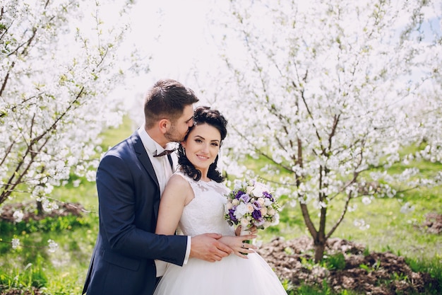 Happy newlyweds enjoying nature