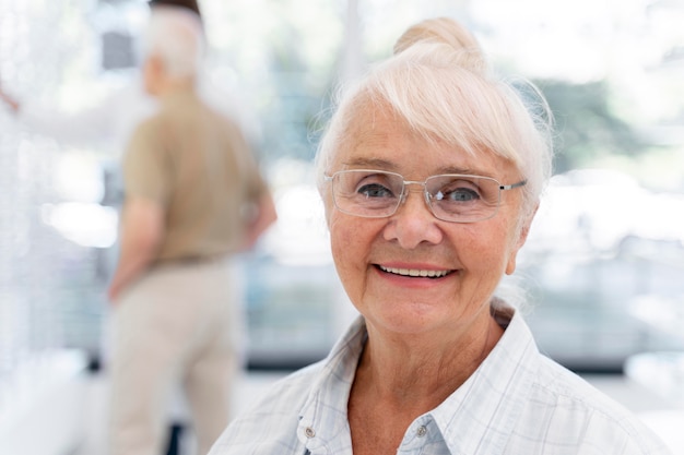 Happy older woman wearing glasses