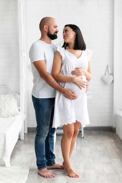 Happy parents looking at each other