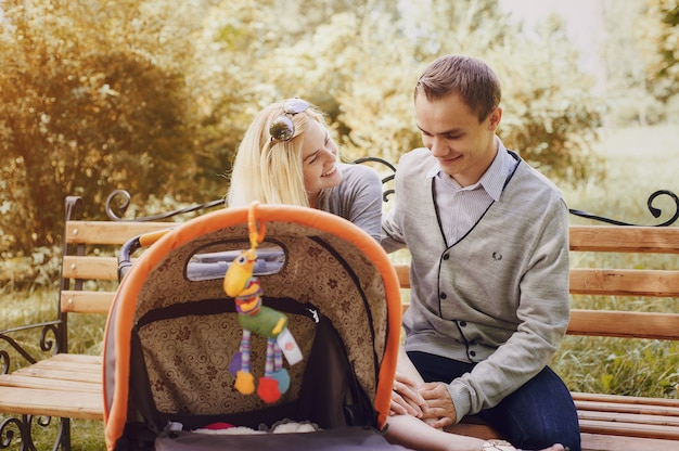 Happy parents sitting on a bench