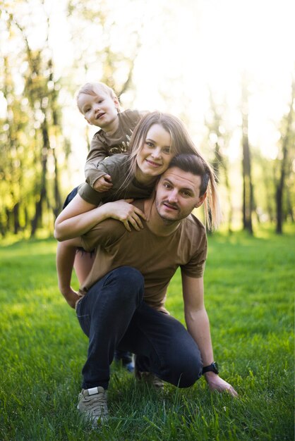 Happy parents with child in nature