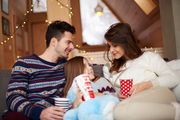 Happy parents with their little daughter