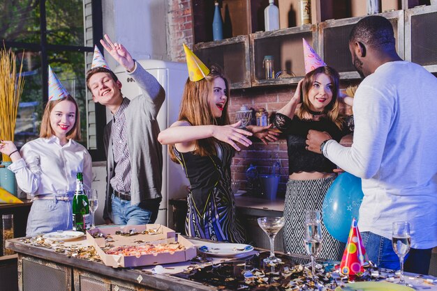 Happy people celebrating on kitchen