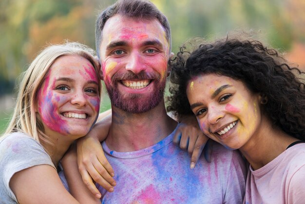 Happy people posing at festival