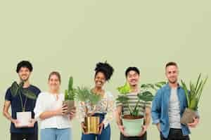 Free photo happy plant lovers holding their potted plants