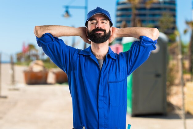 Happy plumber man