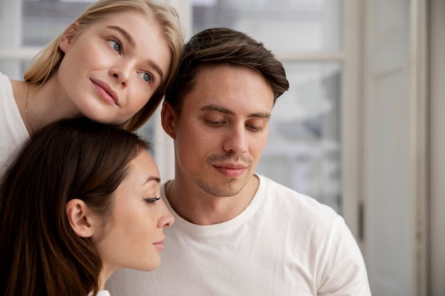 Happy polyamorous people close up