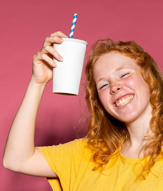 Happy redhead girl cheering