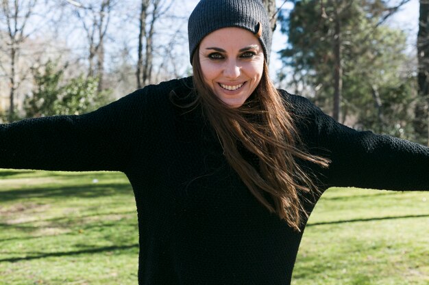 Happy rock girl in park