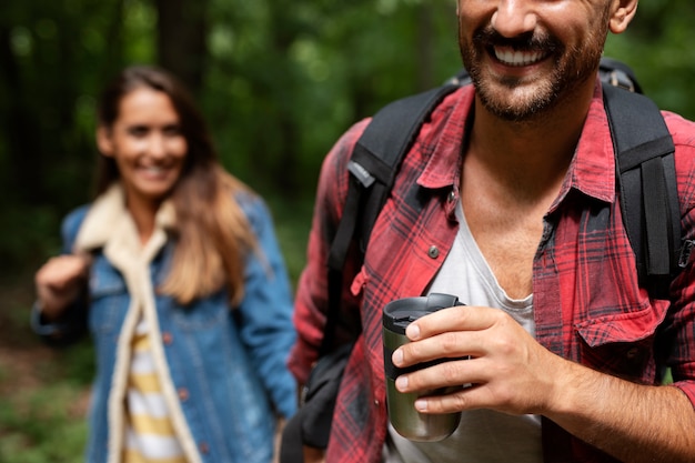 Free photo happy and romantic couple traveling together in nature