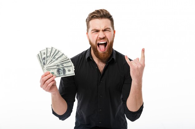 Happy screaming bearded business man in shirt holding money