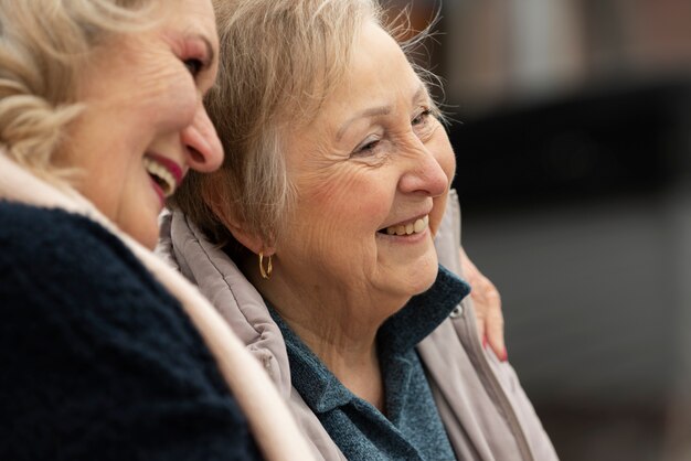 Happy senior friends chatting