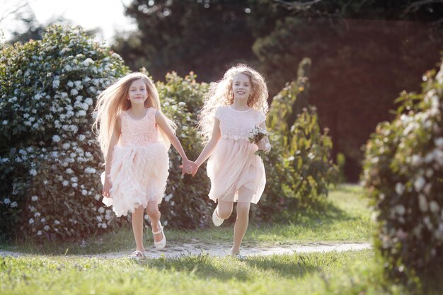 happy sisters portrait outdoor